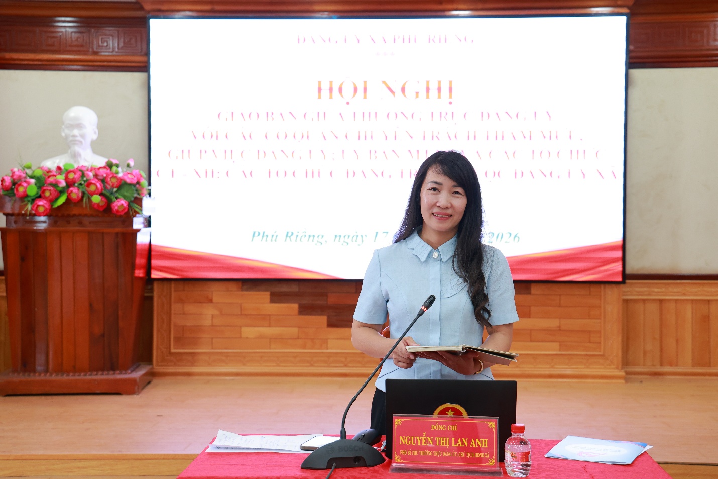 '''A person standing in front of a podium

Description automatically generated'''